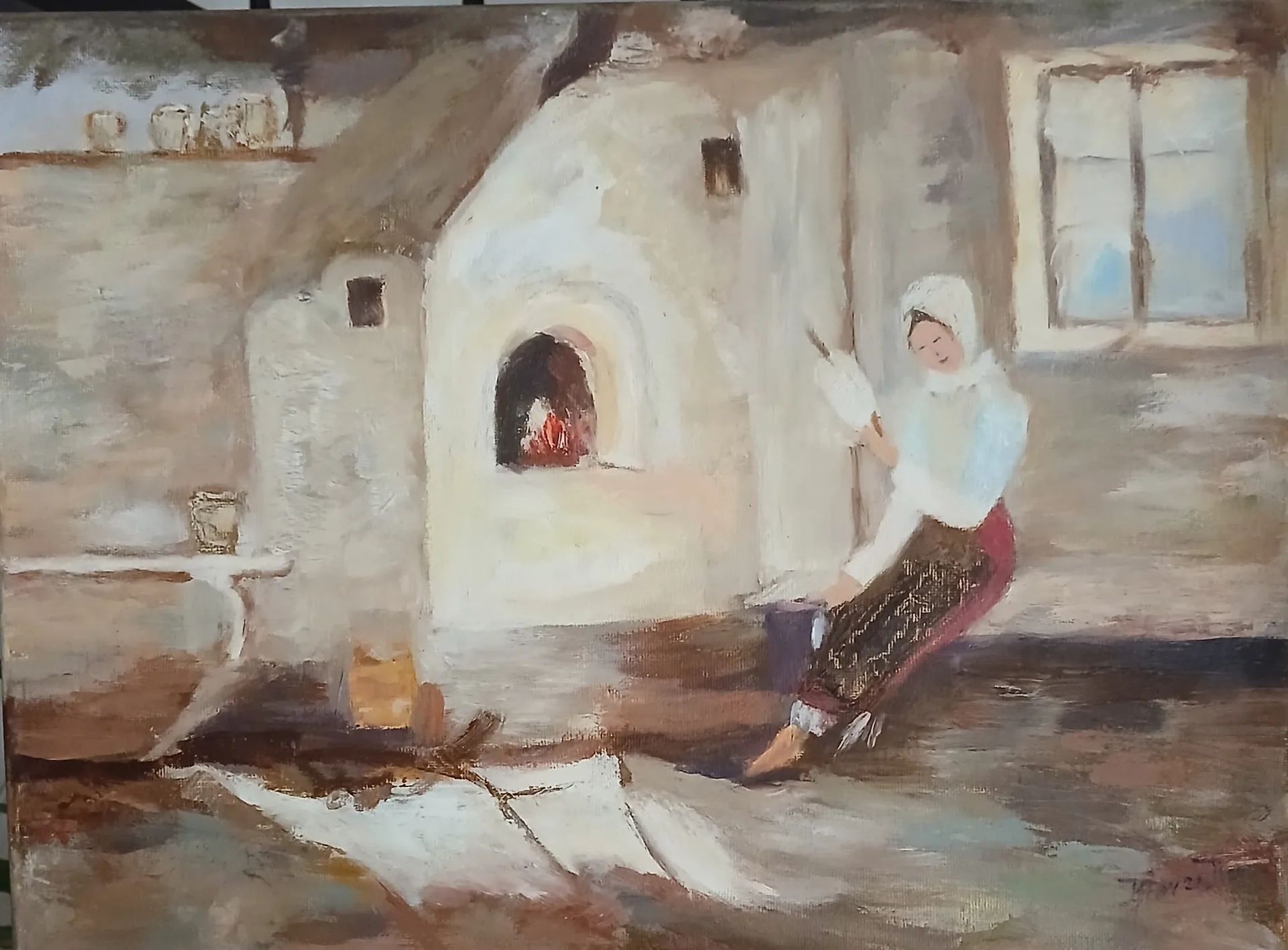 Femeia torcand pe vatra